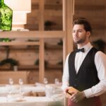 waiter standing with notebook and pen and looking 2024 11 17 12 44 47 utc min